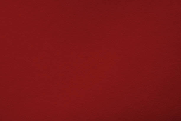 istock Burgundy background with paper texture, horizontal. 1338309737