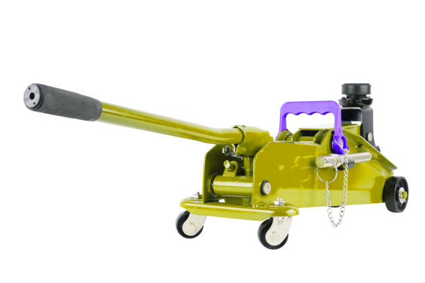 istock yellow hydraulic car jack isolated on white background, lowered 1338309741