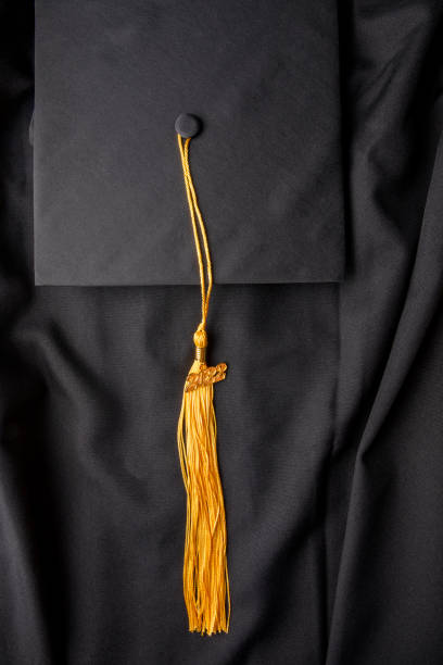 istock Cap and Gown Class of 2022 1338311599