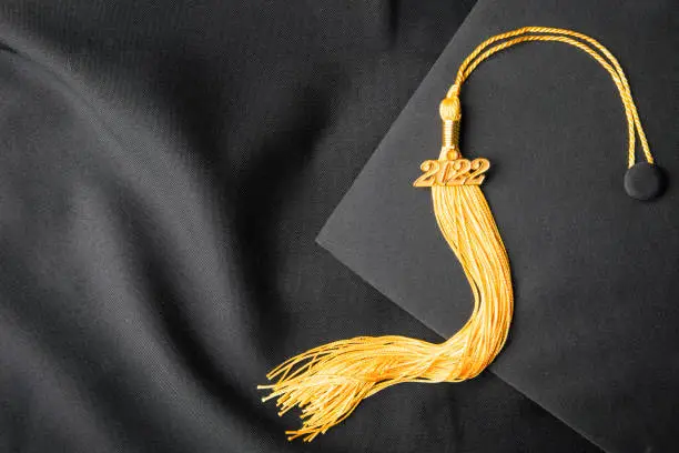 Photo of Graduation Cap and Gown Class of 2022