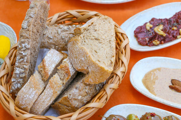 Slices of rye and bran breads on breakfast table