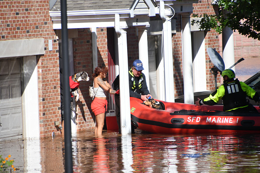 New Brunswick, NJ USA - September 2, 2021: City of New Brunswick flooded after Hurricane Ida. Firefighters rescue flooded in residents of the City of New Brunswick after Hurricane Ida.