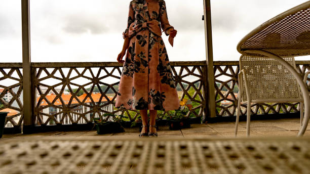 istock woman's body in a bow dress 1338335847