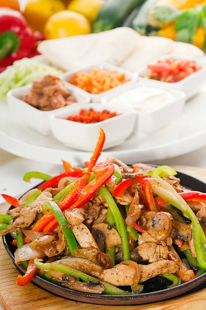 istock original fajita sizzling hot  on iron plate 133834671