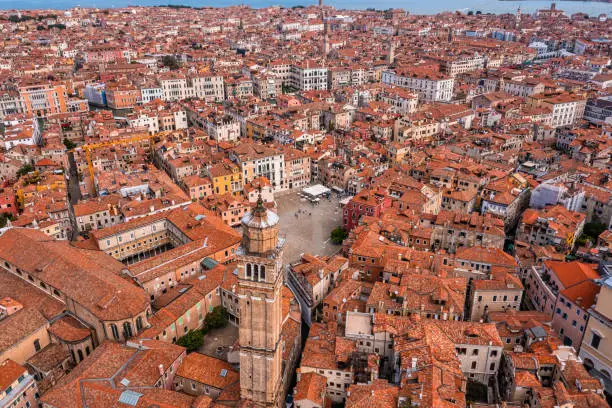 Photo of Beautiful orange roofs of Venice in Italy. Aerial view.