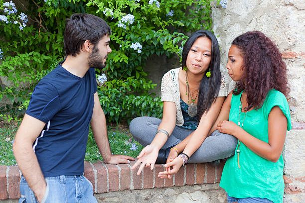 istock Teenagers Talking at Park 133834902