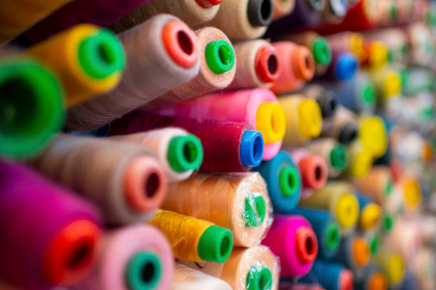 istock large group of variation colourful sewing thread spool in small business work place studio 1338352289