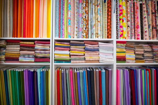 retail place tailor studio workplace tradizione batik tessuto fashion workshop retail display - negozio di tessuti foto e immagini stock