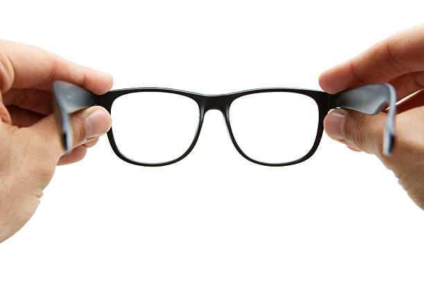 istock Human hands holding retro style eyeglasses 133835728