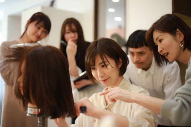 istock Hairdresser's training image 1338358829