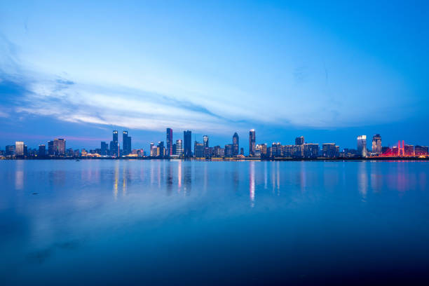 istock Night view of Chinese cities, river skyline 1338363445