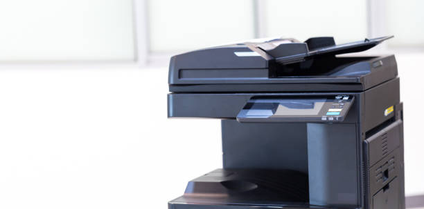 istock photocopier or network printer is office worker tool equipment for scanning and copy paper. 1338367558