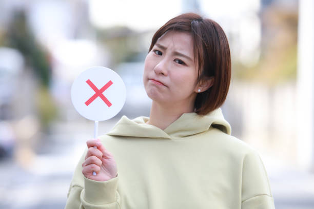 istock × Woman with a tag 1338367650