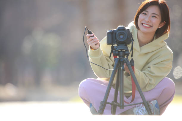 istock Woman taking a picture 1338367694
