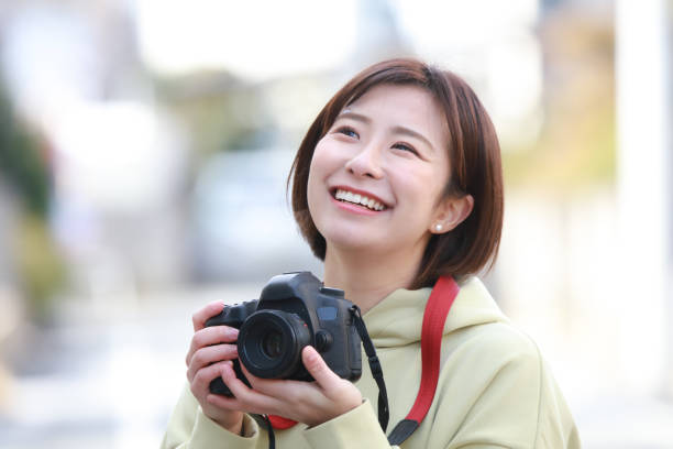 istock Woman taking a picture 1338367722