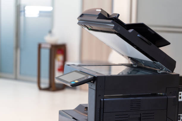istock photocopier or network printer is office worker tool equipment for scanning and copy paper. 1338368832