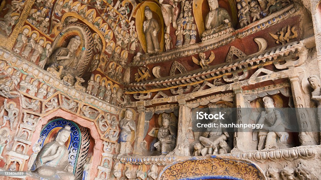 Buda de Longmen - Foto de stock de Grutas de Yungang royalty-free