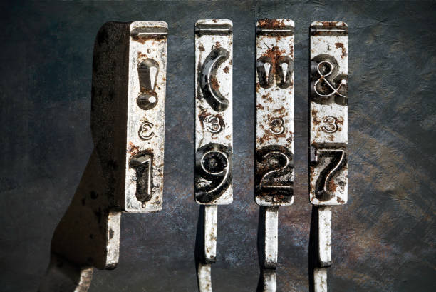 istock vintage old typewriter hammers with the date 1927  isolated 1338373079
