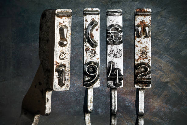 istock vintage old typewriter hammers with the date 1942  isolated 1338373110