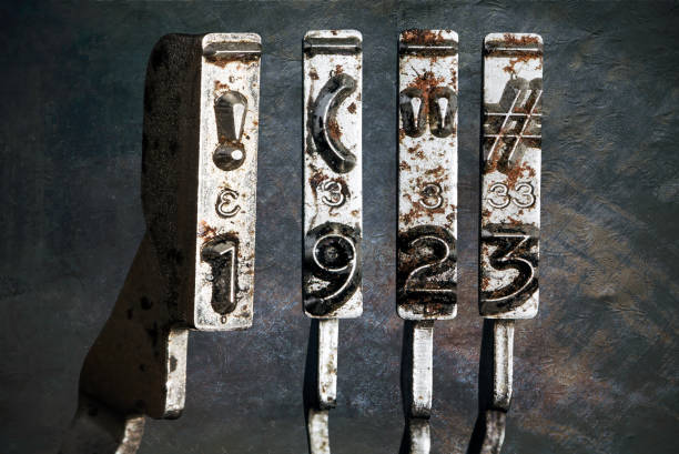 istock vintage old typewriter hammers with the date 1923  isolated 1338373137