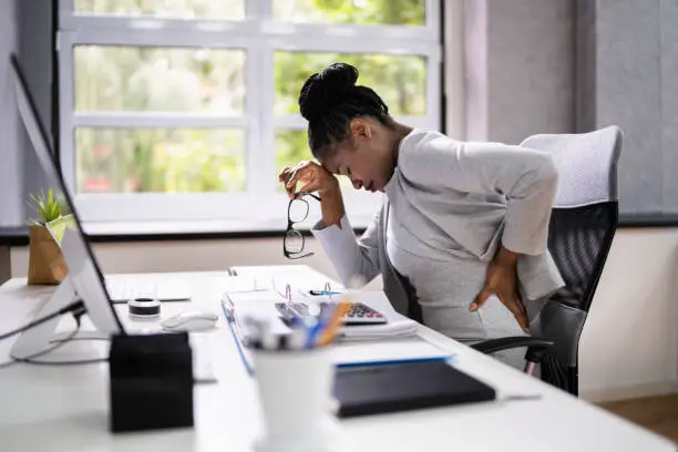 Back Pain Bad Posture Woman Sitting In Office