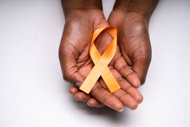 istock Orange Ribbon To Support Kidney Cancer 1338373219