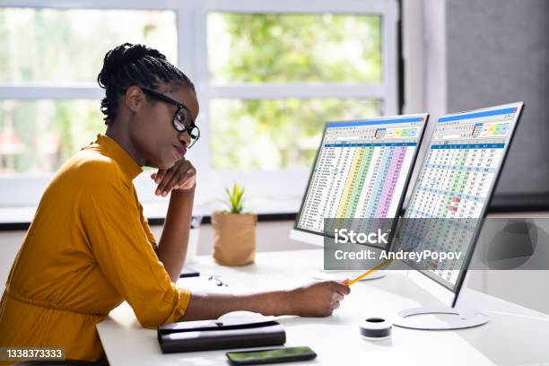 Unhappy Bored African American Woman Stock Photo - Download Image Now - Spreadsheet, Computer, Expense