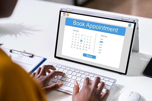 Booking Meeting Calendar Appointment On Laptop Online