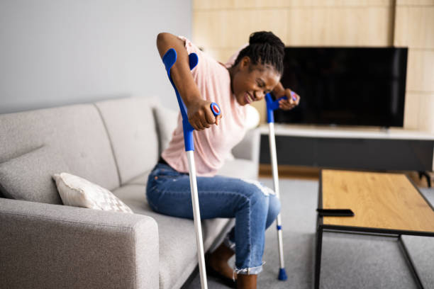 istock Walking With Crutches. Injured Broken Leg 1338373396
