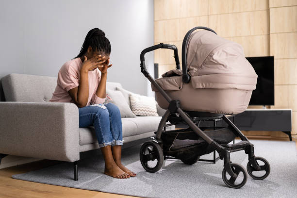 Depressed Unhappy African American Woman With Newborn Depressed Unhappy African American Woman With Newborn. Frustrated Mum postpartum depression stock pictures, royalty-free photos & images