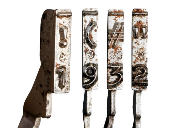 istock vintage old typewriter hammers with the date 1932  isolated 1338375039