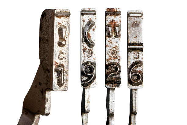 istock vintage old typewriter hammers with the date 1926  isolated 1338375140