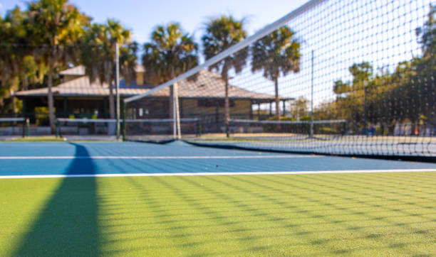 Tropical tennis court resort sunny day stock photo