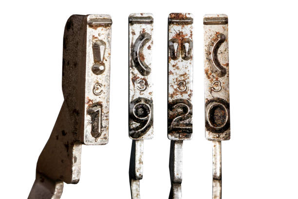 istock vintage old typewriter hammers with the date 1920 isolated,rust 1338377988