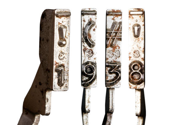 istock vintage old typewriter hammers with the date 1938  isolated 1338378175