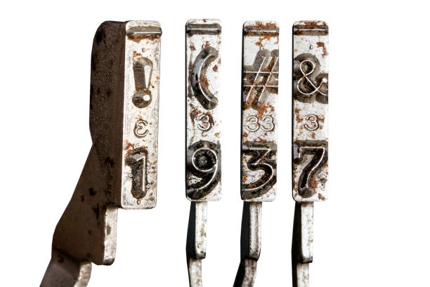 vintage old typewriter hammers with the date 1937  isolated