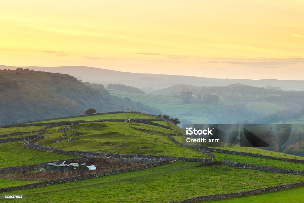 Sunset in the Peak District A landscape shot of the Peak District in Derbyshire at sunset. Agricultural Field Stock Photo