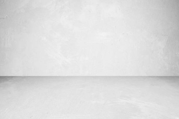 istock Empty white concrete room and floor background, Perspective grey gradient concrete room for interior background, backdrop,  Gray grunge cement room with space for product display mockup, template 1338378743