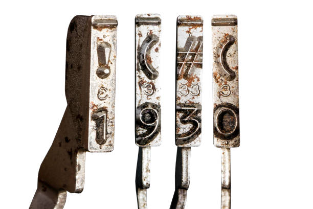 istock vintage old typewriter hammers with the date  1930  isolated 1338378832