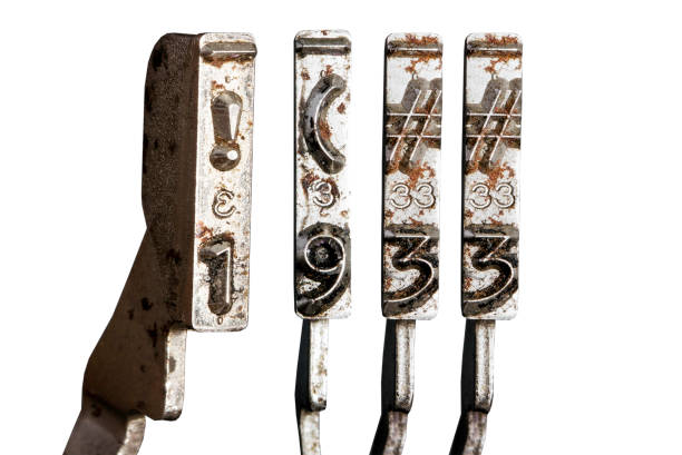 vintage old typewriter hammers with the date 1933  isolated