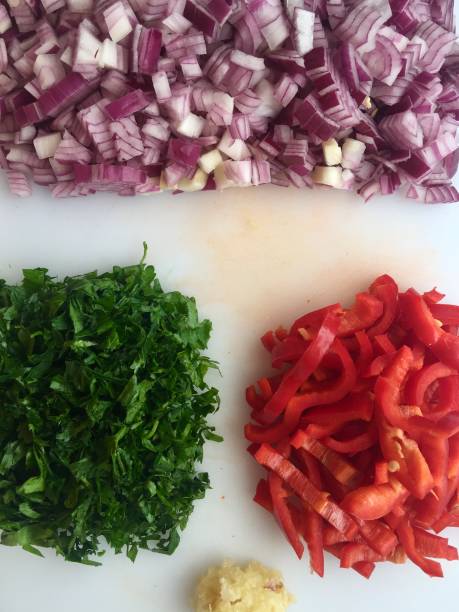 istock Chopped Red Peppers, Red Onion, Garlic and Parsley 1338383401
