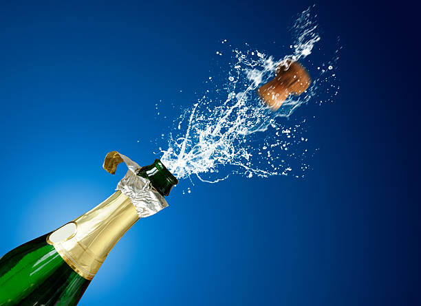 champaign still with champaign popping and splashing uncork wine stock pictures, royalty-free photos & images