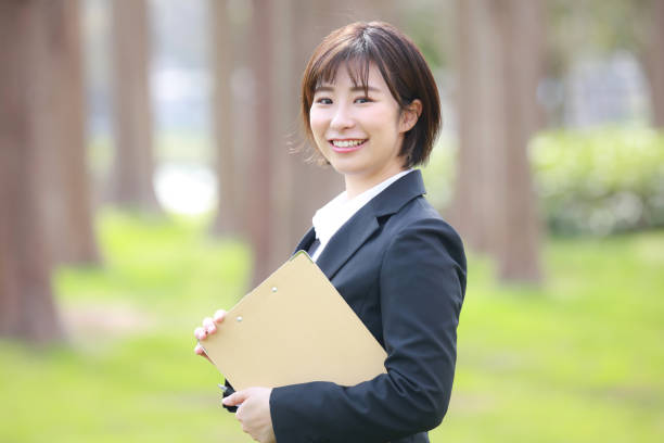 istock Female employee with binder 1338392290