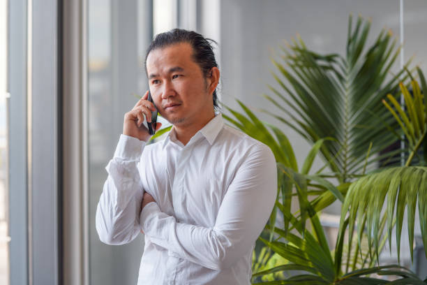 istock Young Adult Asian Businessman Working 1338400903