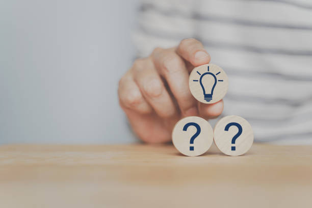 istock human's hand choose green bright light bulb icon on circle wood, for good idea, best selection, best solution, brain storm, leadership concept 1338401683