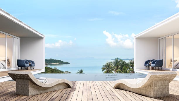 istock Swimming pool terrace between modern building with sea view 3d render 1338401709