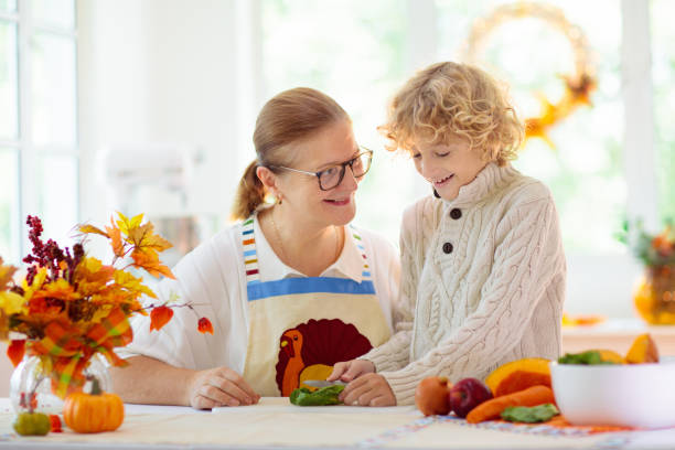 istock Family cooking Thanksgiving dinner 1338406678