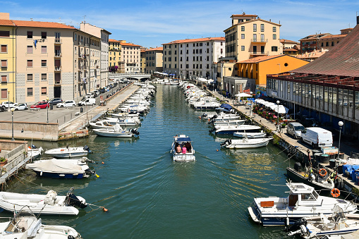 Livorno, Tuscany, Italy - June 27 2021: The Venezia Nuova district was built at the beginning of the eighteenth century as an extension of the Old Fortress and the sixteenth-century city nucleus designed by Bernardo Buontalenti.