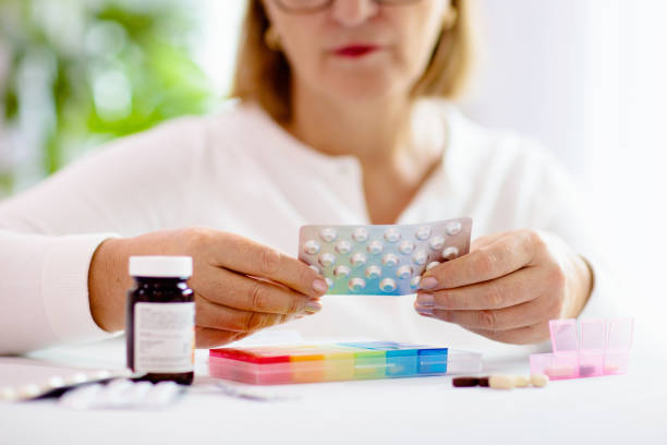 istock Pill box for senior patient. Medicine container. 1338407256