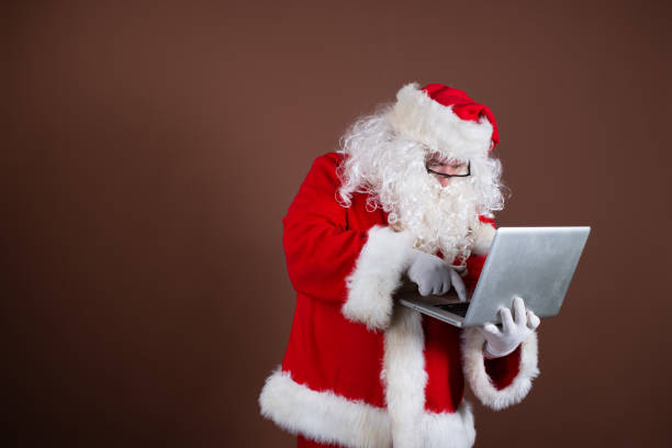 istock Funny Santa Claus reads books. 1338416164